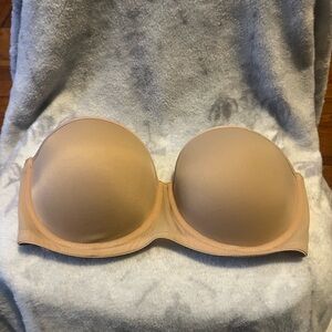 Cream woman size 32D used one’s